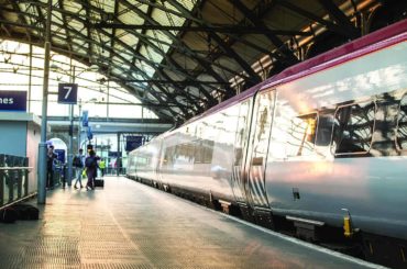 virgin train on the platform at liverpool lime street station