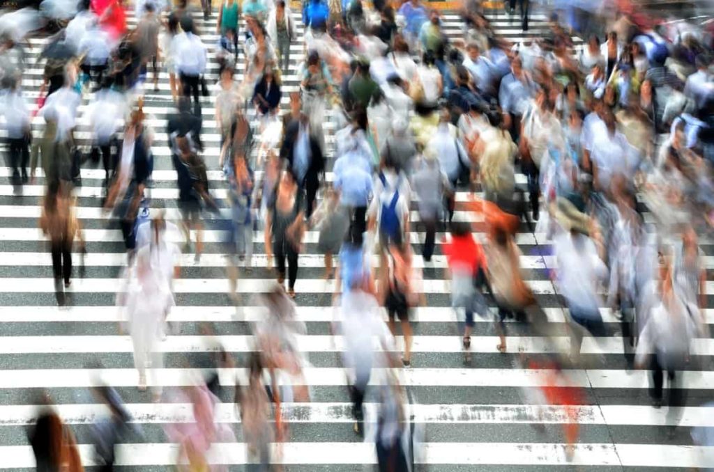 pedestrians on a busy city crossing
