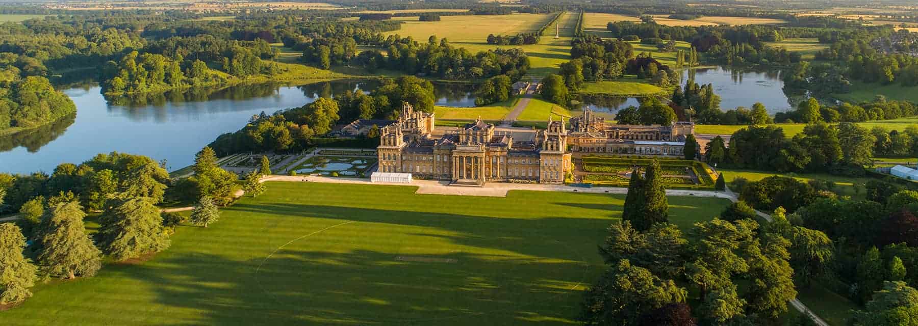 aerial view of blenheim palace and surrounding gardens 